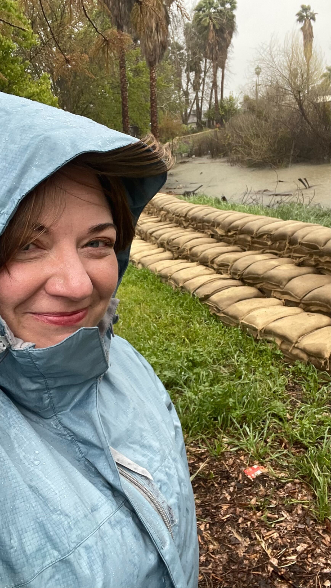 Emma Gallegos reporting on flooding